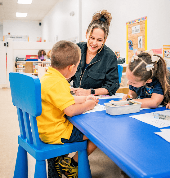 Children engaged in a classroom activity at Children's Paradise